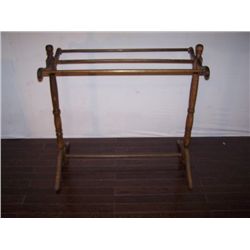 Walnut quilt rack.