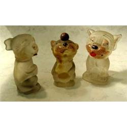 Three frosted glass Bonzo perfume bottles