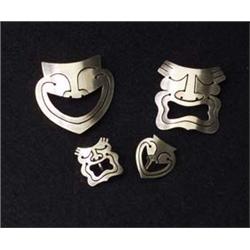 Four-piece REBAJES sterling set, two brooches
