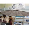Image 1 : Patio umbrella with heavy cast metal stand
