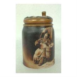 Lenox stein. Brown and tan. Friar eating and