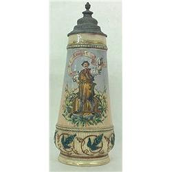 German stein #497. Man holding stein of beer.