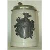 Image 1 : Stoneware stein with pewter lid and shield. N