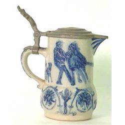 Blue salt glaze pitcher. Children pulling log