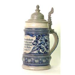 Blue salt-glazed stein. Shield with motto. No