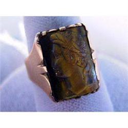 10k man's ring. Yellow gold with carved tiger eye.  4.7 grams $75-95