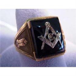 10k man's ring. Yellow gold with masonic emblem on black onyx.  7.5 grams $75-100