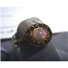 Image 1 : 10k lady's antique ring. Yellow gold with simulated glass opal  center stone. There are twelve glass