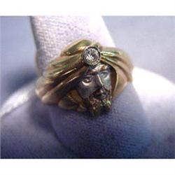 10k man's ring. Yellow gold with synthetic gem. 9.9 grams $100-125