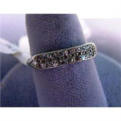 14k lady's ring. White gold with eighteen single cut diamonds.  Estimated total weight is .45 carats