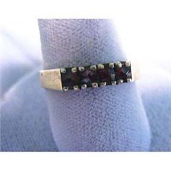 Silver garnet ring. Gold over 800 fine silver with four garnets. 3.3 grams $25-35