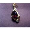 Image 1 : Lady's 14k pearl enhancer with garnet. Pendant is 14k yellow gold  with 2 carat pear cut garnet and