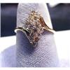 Image 1 : Lady's 14k diamond ring with 16 full cut diamonds. Diamond total  weight is .50 carats. Ring size is