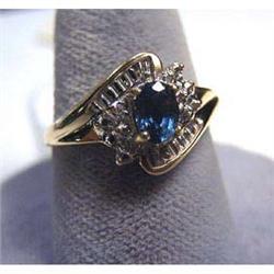 Lady's sapphire and diamond ring, 10k yellow gold. Sapphire  is a nice medium dark color and is appr