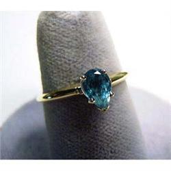 Lady's 14k gold ring with emerald. Yellow gold with .75 carat pear  cut natural emerald. Emerald is