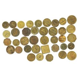 Lot of 38 German copper/brass beer tokens, mid-1800s to mid-1900s.