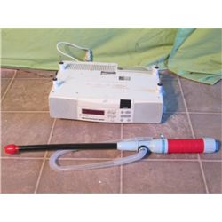 A Spacemaker Compact Disc Player W/ Pump