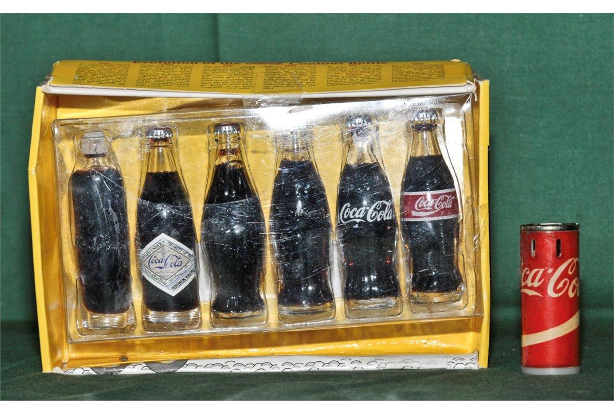 Evolution of coca cola collectors bottles set