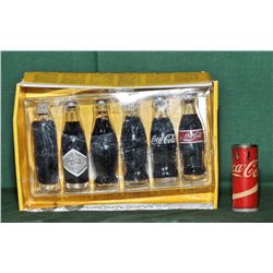 Evolution of coca cola collectors bottles set