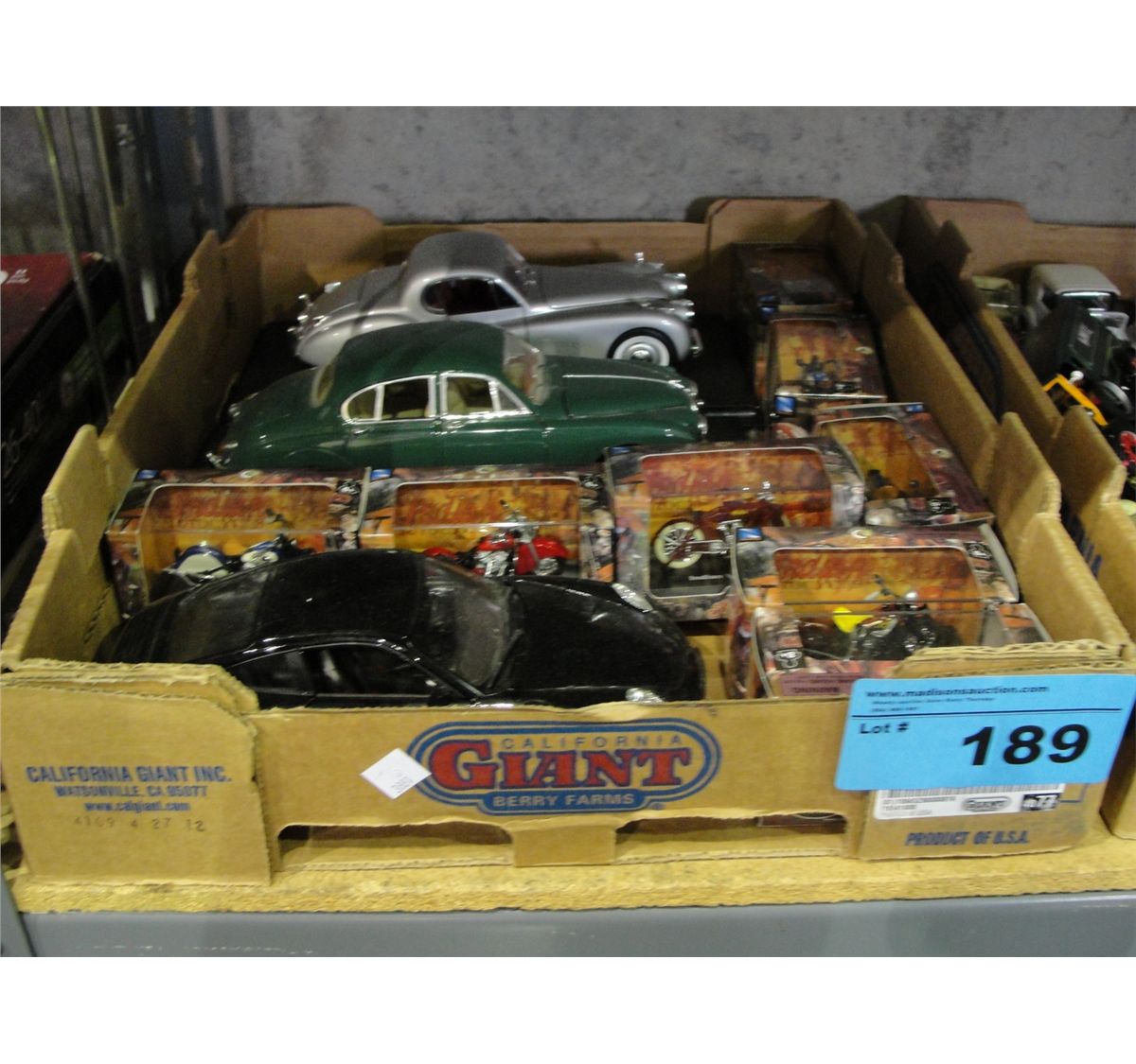 Box of diecast metal collectors cars