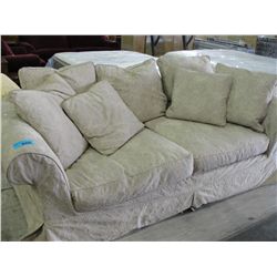 Contemporary overstuffed sofa with throw cushions