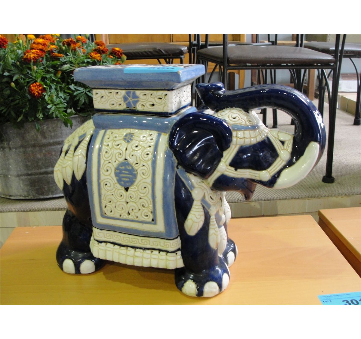 Ceramic elephant plant stand