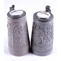 Lot of 2 Stoneware Regensburg Steins1.0 liters, both with grey glazed finish and  pewter lids, one r
