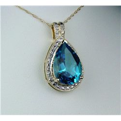 Dazzling 10K Yellow Gold Ladies NecklaceSet with a fine pear shape Swiss blue topaz  weighing approx
