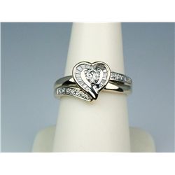 Dazzling 10K YG Ladies Heart Shape RingSet with a combination of round and baguette  cut diamonds we