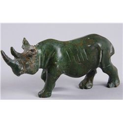Green Carved Hard Stone Rhino FigurineLots of great patina, measures 5"X2".