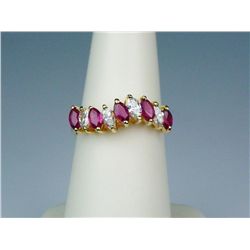 High Quality 14K YG Ladies Anniversary RingFine set with 9 MQ cut diamonds and rubies  weighing appr