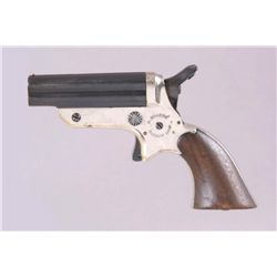Sharps Mdl 1 Cal .22RF SN:1206Early 4 barrel pepperbox pistol chambered in  .22 rimfire. Nickel fini