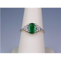 Charming 14K Yellow Gold Ladies RingSet with a center fern green emerald weighing  1.30 carats and 1