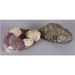 Collection of 2 Small Geodes1 is Pyrite and 1 is Amethyst, each weighs  approx 1.5 lbs