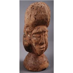 Wood Carving with two faces.…