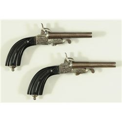 Matched Pair Silver Engraved Pin Fire Pistols