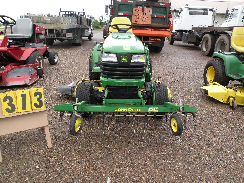 John Deere X585 w/thatcher, 62" deck, 4x4 SN M00430X285369