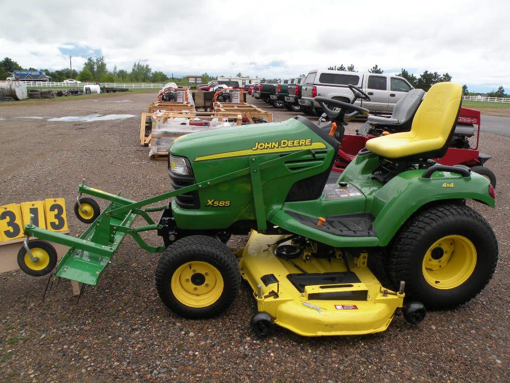 John Deere X585 w/thatcher, 62" deck, 4x4 SN M00430X285369