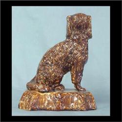 Bennington type Spaniel. Note chip on ear. 10 1/2"h x 8"w $200-300