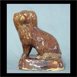 Large Bennington type Spaniel. 10"h x 12" $300-400