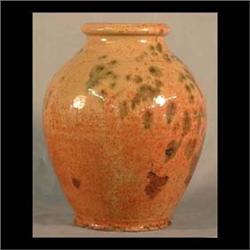 Redware pot. Mottled brown, green, and orange on beige ground.  19th century. Note rim chips at bott