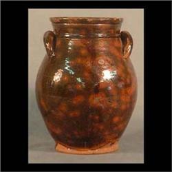 Redware pot, mottled dark brown. High glaze, eared handles.  19th century. Probably Pennsylvania. Mi