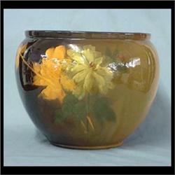 Weller Louwelsa jardiniere with florals. Note hairlines. 13"h x 16"d $200-300
