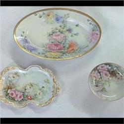 Group of hand-painted china: three-footed bowl, four 6" plates, an  18" platter, and two trays. $200