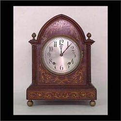 German mantel clock. Mahogany with inlaid decoration. Note minor  veneer damage to back side. 13"h x