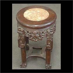 Carved Oriental plant stand, round top with a pink marble  top inset. 14" h x 9 d    $100-150
