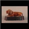 Image 1 : Sewer tile lion door stop. Full figure lion. Brown glaze on a black  glazed base. Note small surface