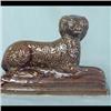 Image 1 : Rockingham reclining dog. Expansion crack done in the making. 6 1/2"h x 9" $170-250