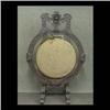 Image 1 : Brass gong supported by a carved wood frame with lion head. 49"h x 32"w x 20"d $350-500
