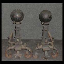 Pair of forged Arts and Crafts andirons. 23"h x 27"d $200-300